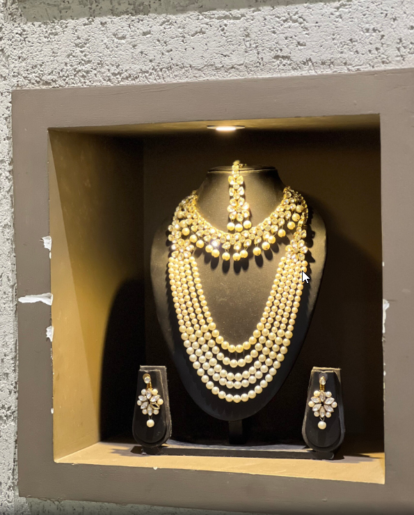 Traditional pearl bridal jewelry showcased by ThreadNest – a sustainable fashion leader in Nashik Startups 2025.