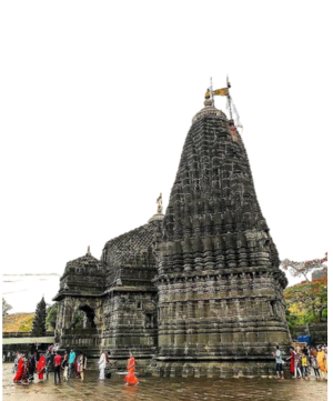 Tranquil Stead Nashik, "Trimbakeshwar Shiva Temple in Nashik surrounded by pilgrims during holy rituals